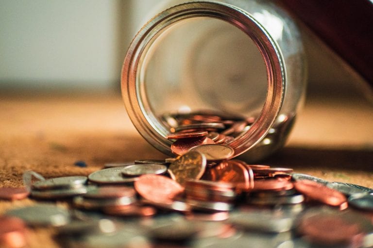 Money out of tipped over jar